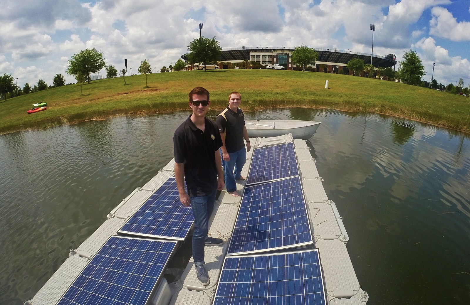 solar panels orlando ucf mechanical engineering students geoffrey gregory foreground and will rumplik stand on the floating array of solar panels that they other floats power orlando sentinel solar panels orlando ucf mechanical engineering students geoffrey gregory foreground and will rumplik stand on the floating array of solar panels that they other floats power orlando sentinel